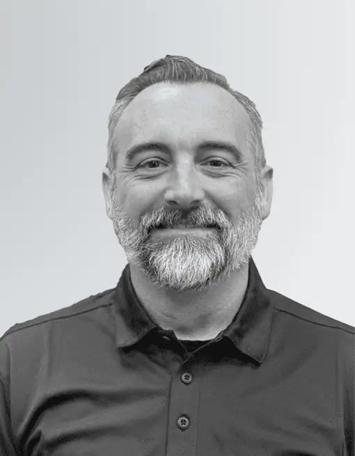 A black and white photo of Justin Dunkerson